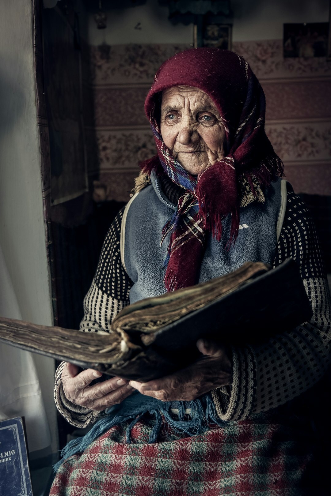 elderly woman reading book